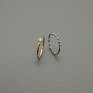 Flechtring Gold mit Diamantrose