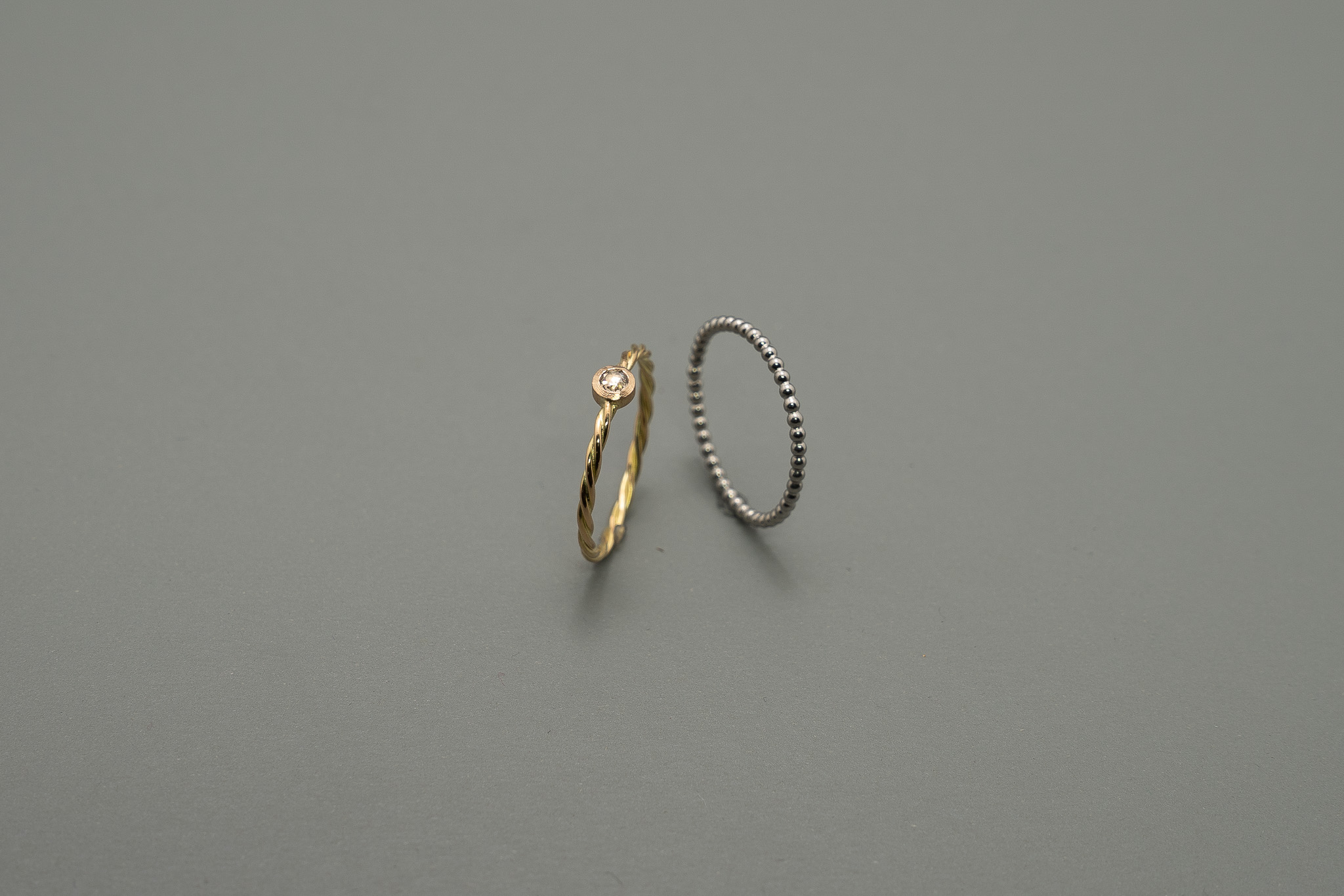 Flechtring Gold mit Diamantrose